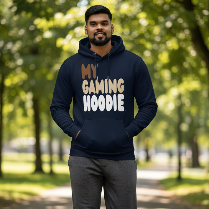 Man walking through city park wearing the APWT Gift Shop's My Gaming Hoodie Premium Unisex Hoodie from the Day in the Life Collection in Navy Blue