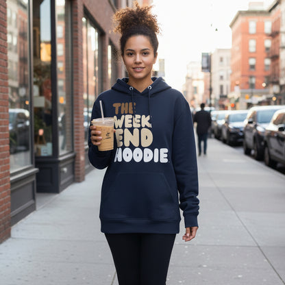 Woman walking down a city street wearing the APWT Gift Shop's The Weekend Hoodie Premium Unisex Hoodie from the Day in the Life Collection and the Premium Basics Collection in Navy Blue