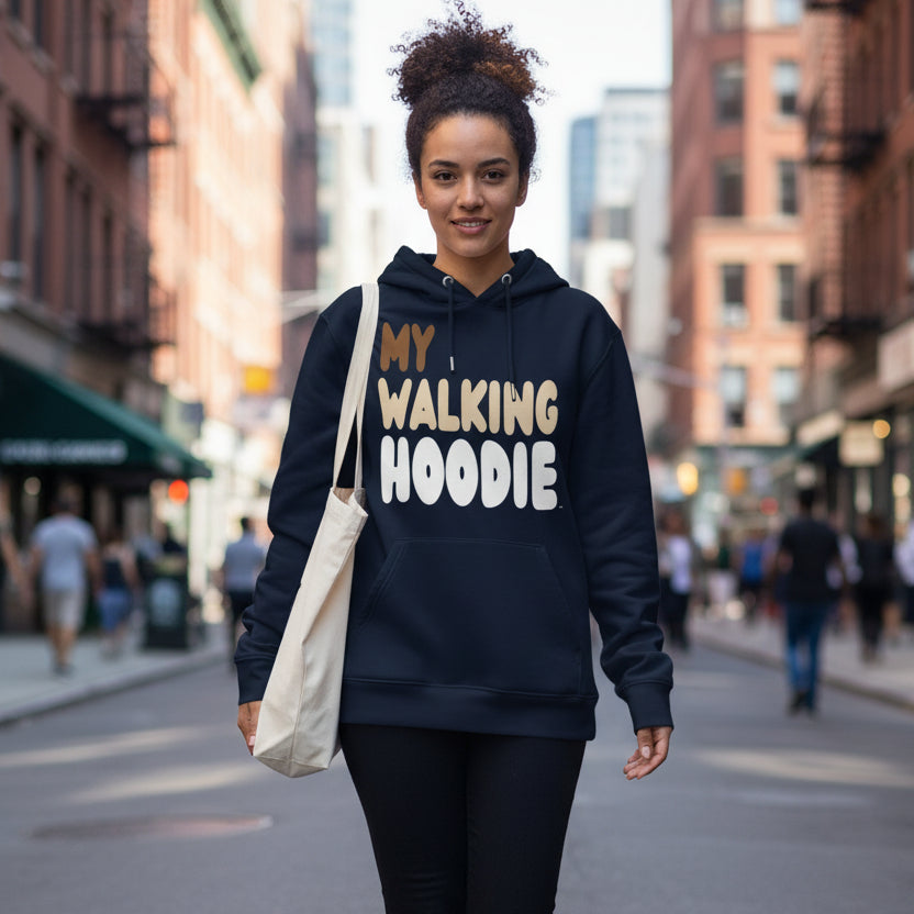 Woman walking down a city street wearing the APWT Gift Shop's My Walking Hoodie Premium Unisex Hoodie from the Day in the Life Collection in Navy Blue