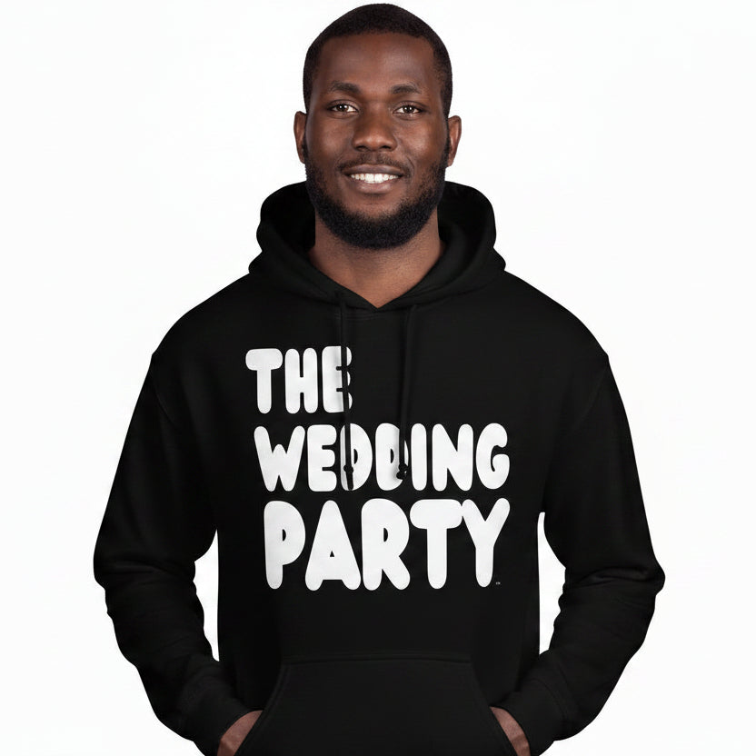 Man wearing the APWT Gift Shop's The Wedding Party Unisex Hoodie from the APWT Wedding Shop in Black