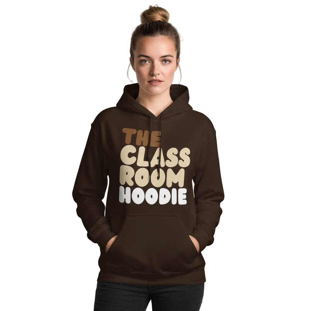 young woman wearing the APWT Gift Shop's the Classroom Hoodie Unisex Hoodie from the Day in the Life Collection in brown