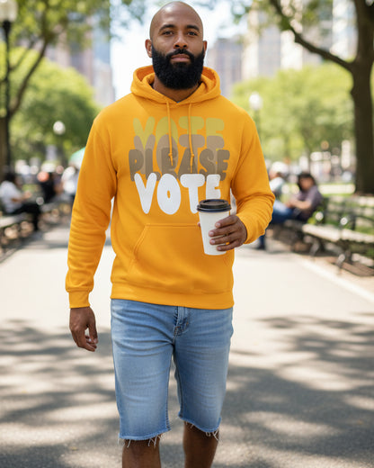 Man walking through city park wearing the APWT Gift Shop's Please Vote in Sunny Yellow Unisex Hoodie from the APWT Vote Shop