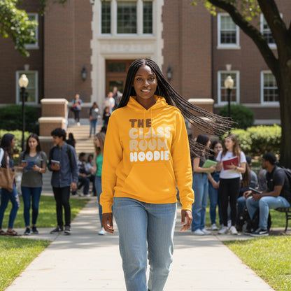 Woman wearing the APWT Gift Shop's the Classroom Hoodie from the Day in the Life Collection in Yellow gold standing on a school campus