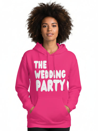 Woman wearing the APWT Gift Shop's The Wedding Party Unisex Hoodie from the APWT Wedding Shop in Hot Pink