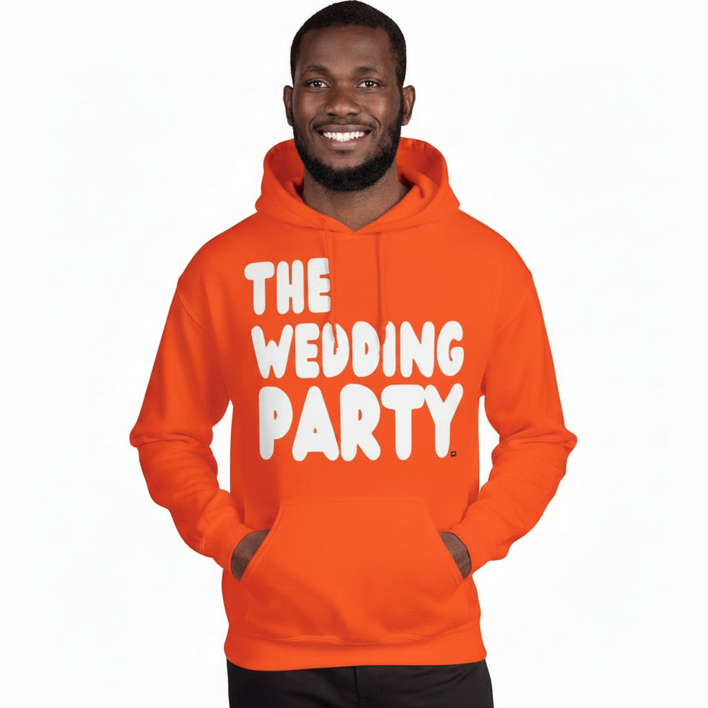 Man wearing the APWT Gift Shop's The Wedding Party Unisex Hoodie from the APWT Wedding Shop in Orange