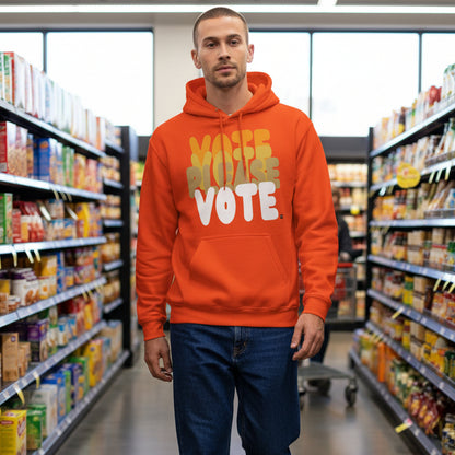 Man walking through a grocery store wearing the APWT Gift Shop's Please Vote in Safety Cone Orange Unisex Hoodie from the APWT Vote Shop