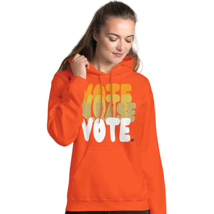 Woman wearing Please Vote in Safety Cone Orange Unisex Hoodie from the APWT Gift Shop -  Vote Advocacy Sweatshirt