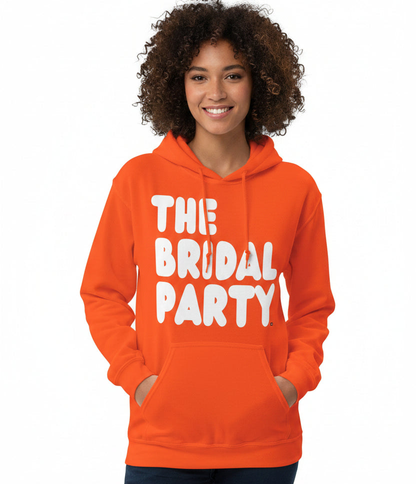Woman wearing The APWT Gift Shop's the Bridal Party Unisex Hoodie from the APWT Wedding Shop in Orange