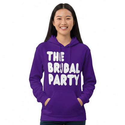 Woman wearing The APWT Gift Shop's the Bridal Party Unisex Hoodie from the APWT Wedding Shop in Purple