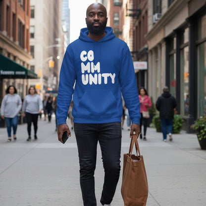 Man walking down the street wearing the APWT Gift Shop's A Community in Ocean Blue Unisex Hoodie from the Community Collection