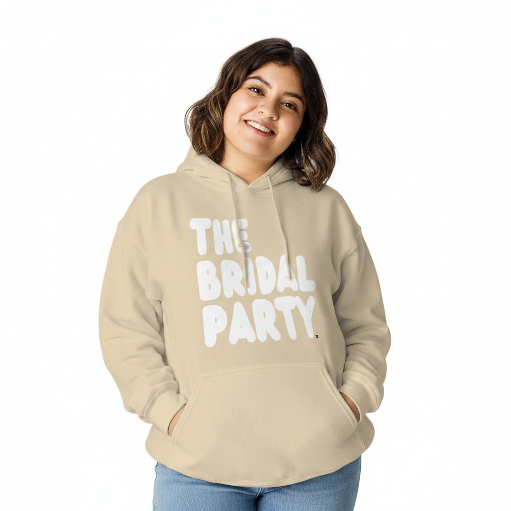 Woman wearing The APWT Gift Shop's the Bridal Party Unisex Hoodie from the APWT Wedding Shop in Beige