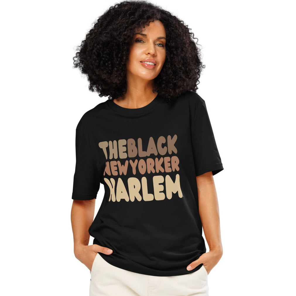 Woman wearing The Black NewYorker Harlem Premium Unisex T-Shirt in Black