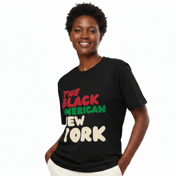 Woman wearing the APWT Gift Shop's the Black American Premium Unisex T-shirt from the Black Collection