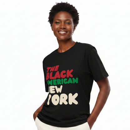 Woman wearing the APWT Gift Shop's the Black American Premium Unisex T-shirt from the Black Collection