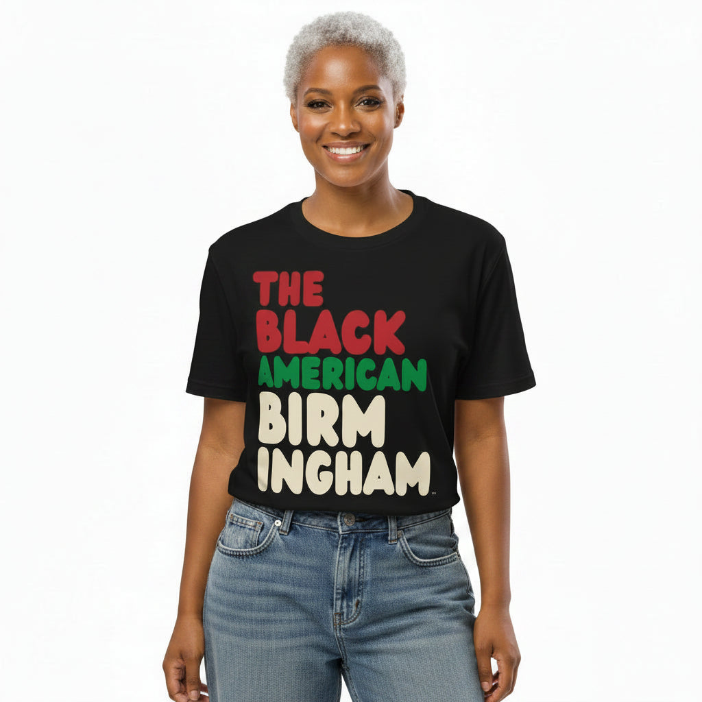 Woman wearing the APWT Gift Shop's the Black American Birmingham Premium Unisex T-Shirt from the Black Collection