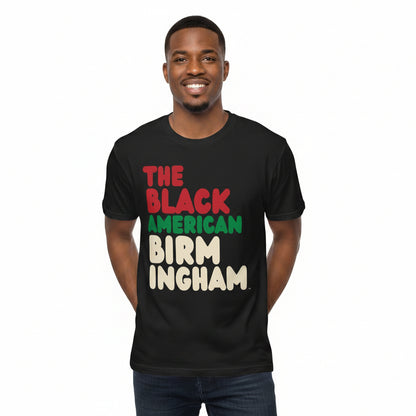 Man wearing the APWT Gift Shop's the Black American Birmingham Premium Unisex T-Shirt from the Black Collection