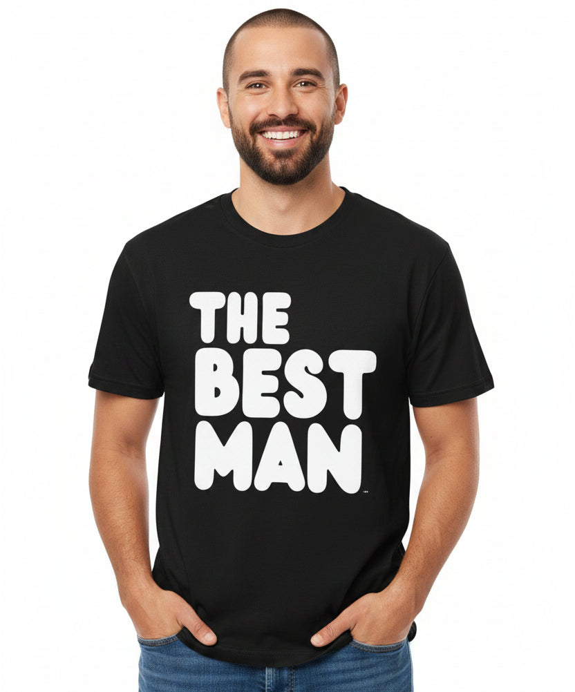 Man wearing the APWT Gift Shops The Best Man Premium Unisex T-Shirt from the APWT Wedding Shop in Black