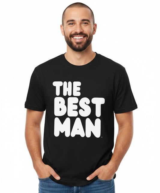 Man wearing the APWT Gift Shops The Best Man Premium Unisex T-Shirt from the APWT Wedding Shop in Black