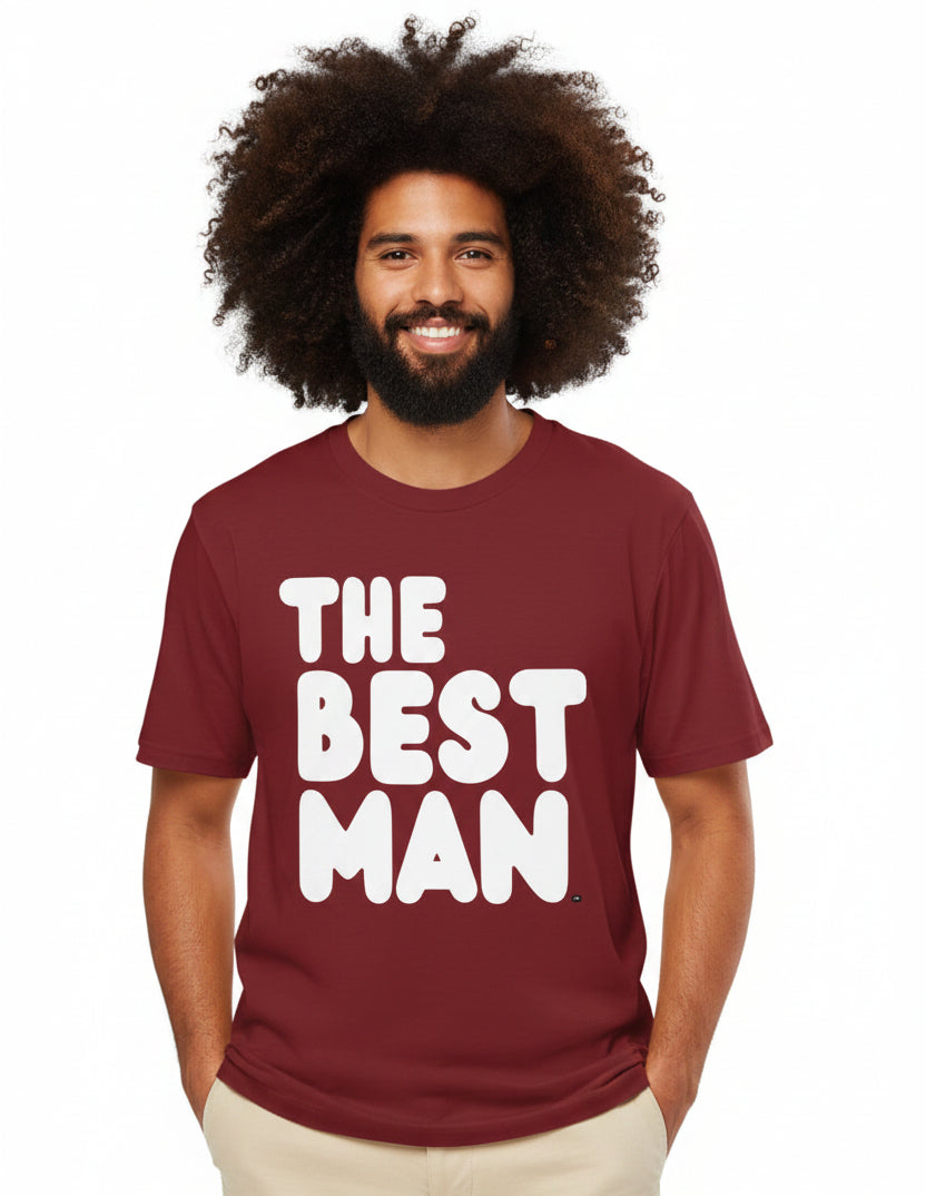 Man wearing the APWT Gift Shops The Best Man Premium Unisex T-Shirt from the APWT Wedding Shop in Burgundy