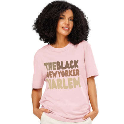 Woman wearing The Black NewYorker Harlem Premium Unisex T-Shirt in Pink