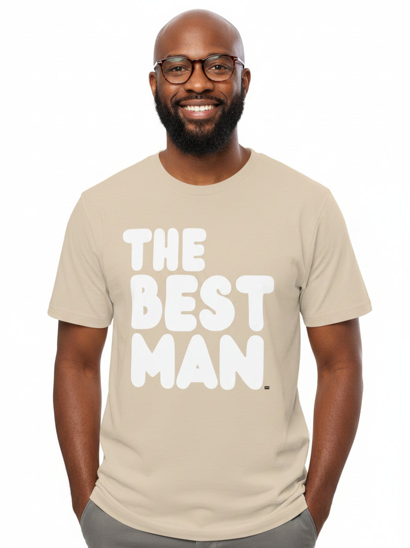 Man wearing the APWT Gift Shops The Best Man Premium Unisex T-Shirt from the APWT Wedding Shop in Beige