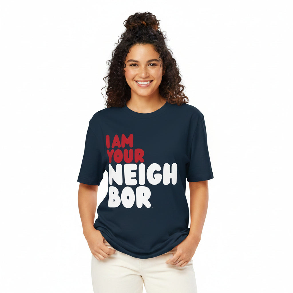 Woman wearing the APWT Gift Shop's I Am Your Neighbor in Turmoil Premium Unisex T-Shirt from the Day in the Life Collection