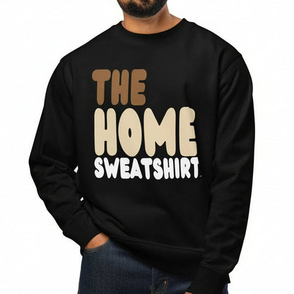 Man wearing a black sweatshirt with 'THE HOME SWEATSHIRT' text on a white background