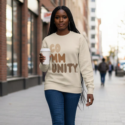 Woman walking down a city street wearing the APWT Gift Shop's Our Community Premium Unisex Crew Neck Sweatshirt from the Community Collection and the Premium Basics Collection in Beige
