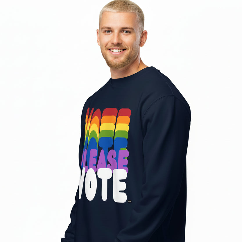 Man wearing the APWT Gift Shop's Please Vote in Color Premium Unisex Sweatshirt