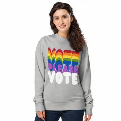 Woman wearing the APWT Gift Shop's Please Vote in Color Premium Unisex Sweatshirt in grey