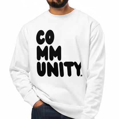 Man wearing a white sweatshirt with 'COMMUNITY' printed on it against a white background