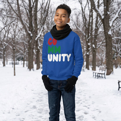Boy wearing the APWT Gift Shop's Holiday Community Kid's Unisex Crew Neck Sweatshirt from the Community Collection and the APWT Kid's Shop in royal blue
