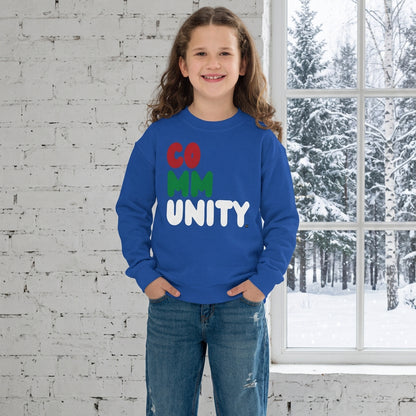 Girl wearing the APWT Gift Shop's Holiday Community Kid's Unisex Crew Neck Sweatshirt from the Community Collection and the APWT Kid's Shop in royal blue