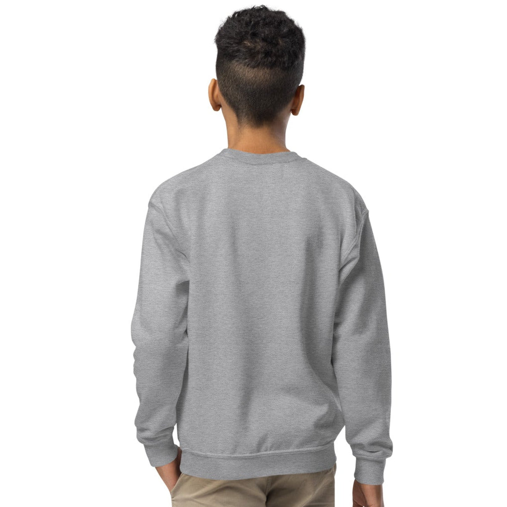 Boy wearing the APWT Gift Shop's Holiday Community Kid's Unisex Crew Neck Sweatshirt from the Community Collection and the APWT Kid's Shop in Grey - Back