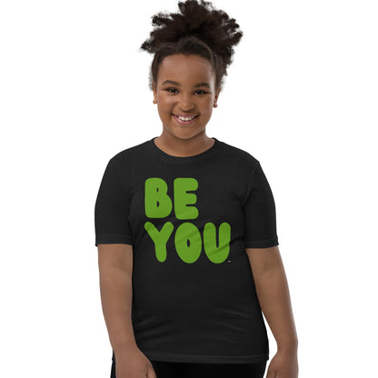 Child wearing a black t-shirt with a yellow and green logo on a white background